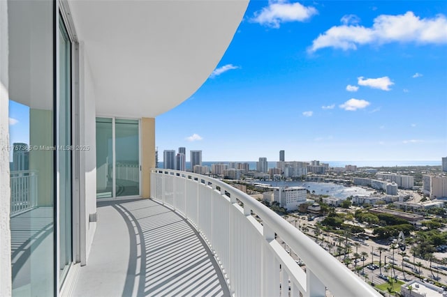 balcony featuring a view of city