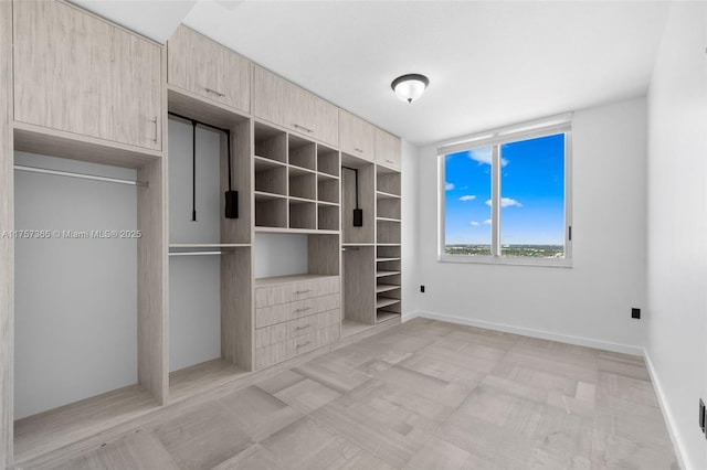 unfurnished bedroom featuring baseboards