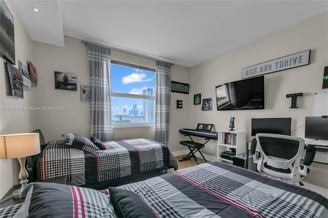 bedroom featuring baseboards