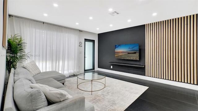603 N 32nd Ave, Hollywood, FL 33021 - living area featuring baseboards, an accent wall, visible vents, and recessed lighting