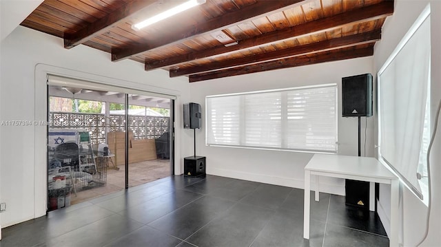 603 N 32nd Ave, Hollywood, FL 33021 - office space featuring wood ceiling, beamed ceiling, dark tile patterned floors, and baseboards