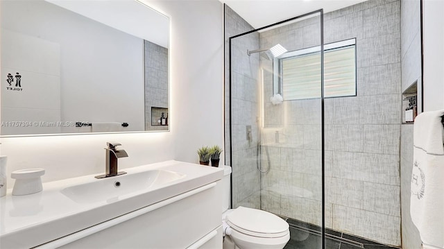 603 N 32nd Ave, Hollywood, FL 33021 - full bathroom with vanity, a tile shower, and toilet
