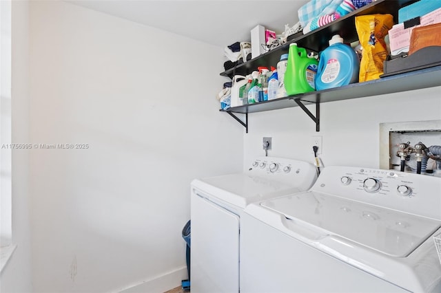 laundry area with laundry area and washing machine and dryer