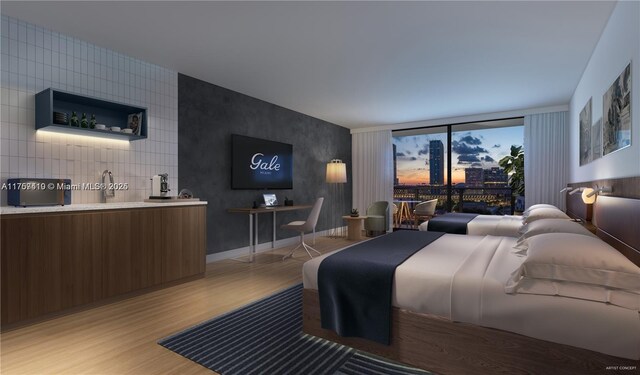 601 NE 1st Ave Unit 1716, Miami, FL 33132 - bedroom with light wood finished floors and baseboards