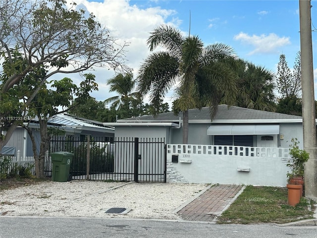 view of gate featuring a fenced front yard