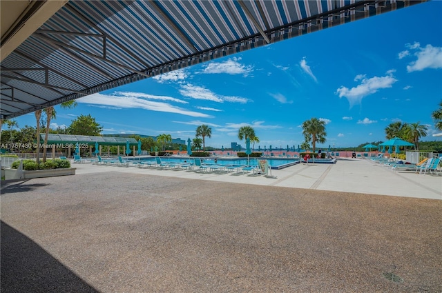 community pool featuring a patio