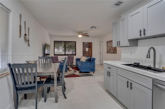 dining space with visible vents and a ceiling fan