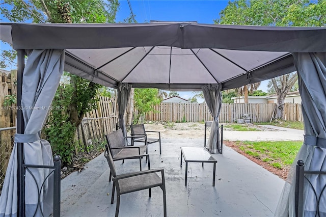 6444 Mcclellan St, Hollywood, FL 33024 - view of patio featuring a gazebo and a fenced backyard