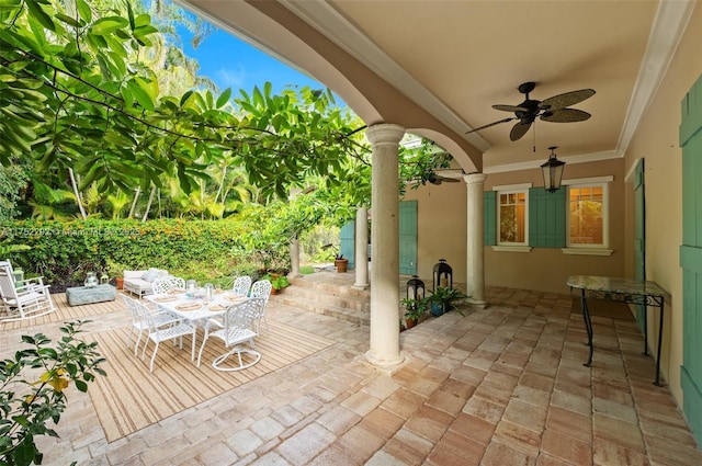 view of patio / terrace featuring outdoor dining space and ceiling fan