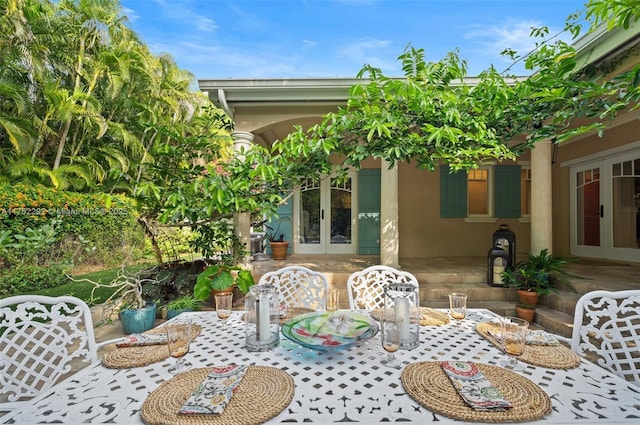 view of patio with french doors and outdoor dining area