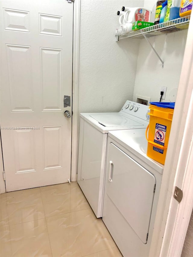 laundry room featuring laundry area and washing machine and dryer