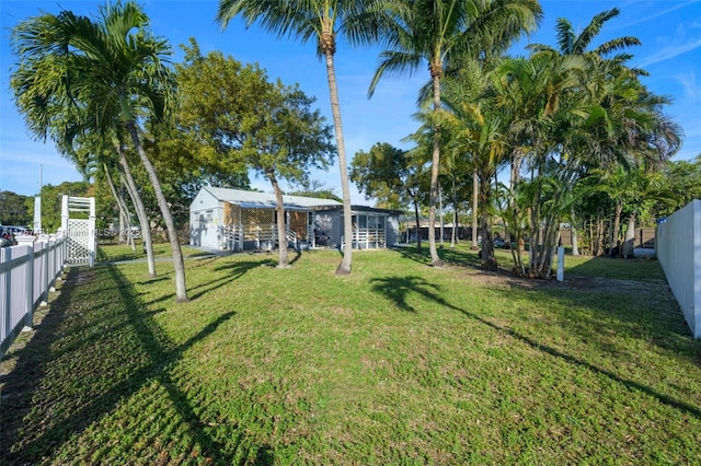 view of yard with a fenced backyard