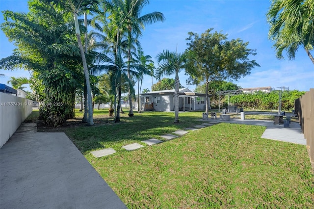 view of yard featuring fence