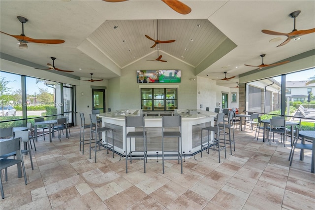 view of patio with exterior bar