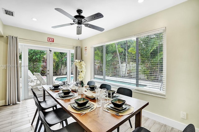 dining area featuring light wood-style floors, recessed lighting, visible vents, and baseboards