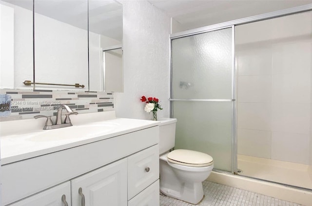 bathroom with toilet, a stall shower, tasteful backsplash, and tile patterned flooring