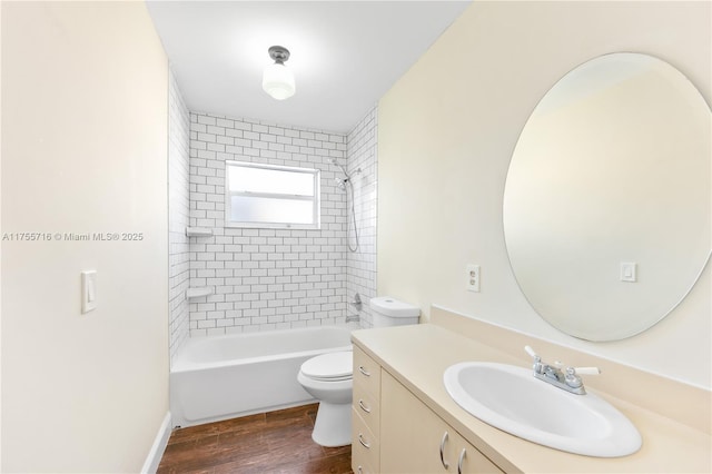 bathroom with vanity, shower / washtub combination, wood finished floors, and toilet