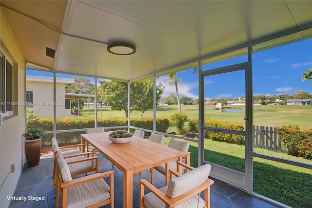 2927 NW 46th St, Tamarac, FL 33309 - sunroom / solarium with outdoor dining area, a water view, and view of golf course