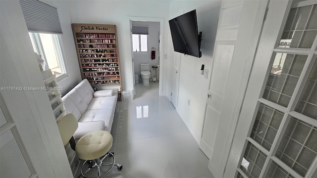 bathroom featuring tile patterned flooring and toilet