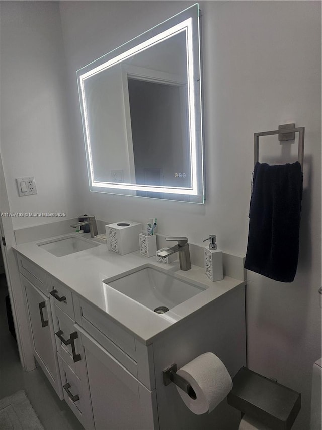 bathroom with double vanity and a sink