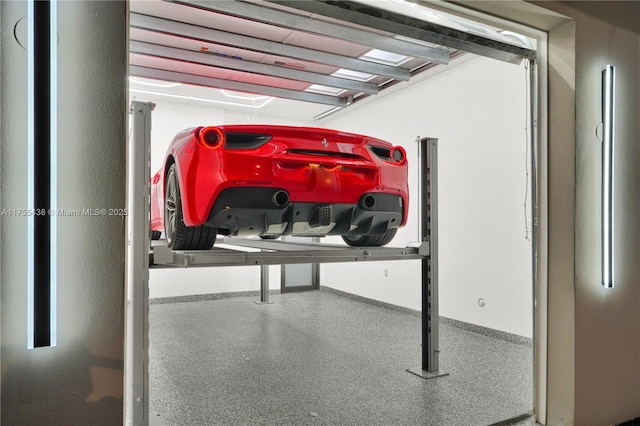 garage with baseboards