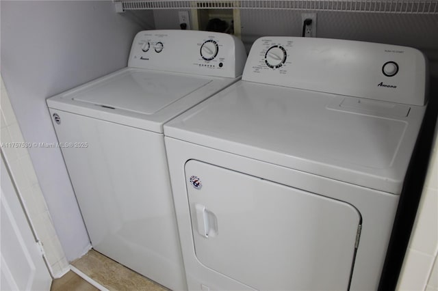 laundry area with laundry area and separate washer and dryer