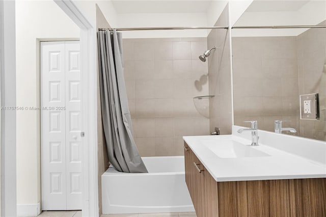 bathroom with shower / bath combo, a closet, and vanity