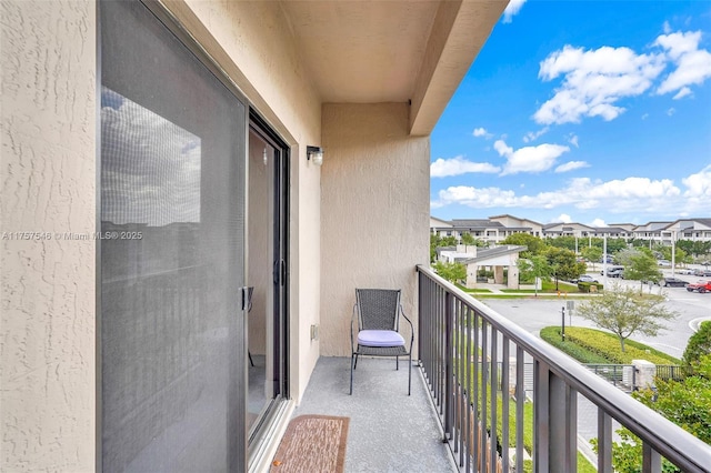 balcony featuring a residential view