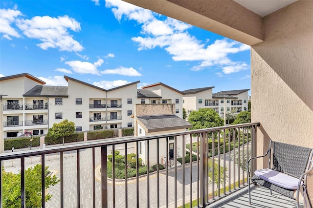 balcony featuring a residential view