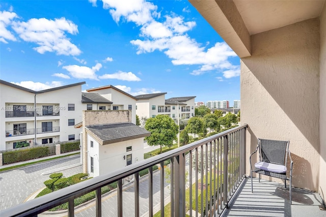 balcony featuring a residential view