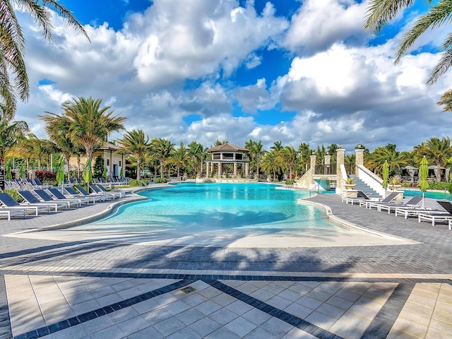 pool with a patio