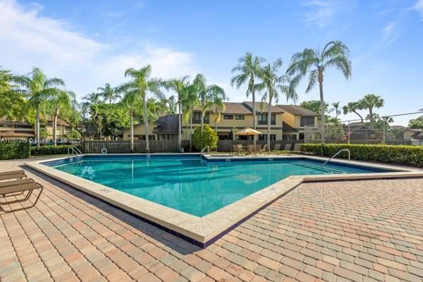 pool featuring fence