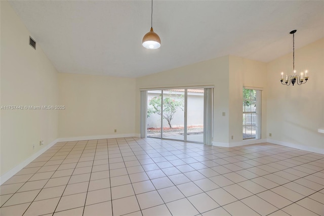 empty room with light tile patterned floors, baseboards, visible vents, lofted ceiling, and a notable chandelier