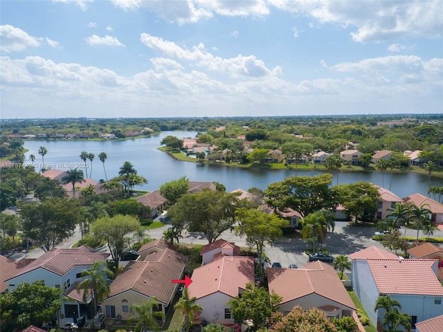 aerial view with a residential view and a water view