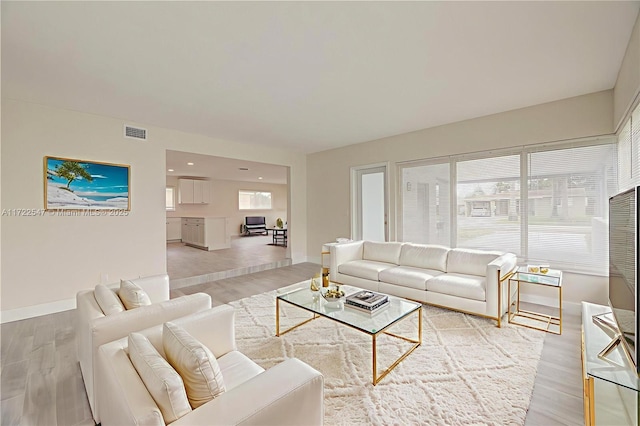 610 N 31st Ct, Hollywood, FL 33021 - living area featuring light wood finished floors and baseboards