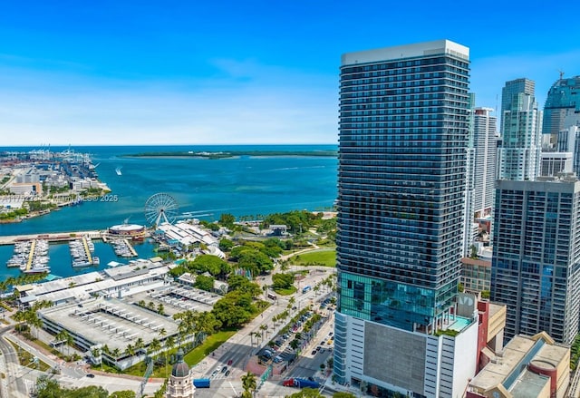 aerial view featuring a water view and a city view