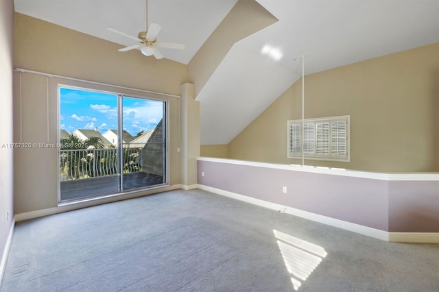 additional living space with visible vents, baseboards, ceiling fan, carpet, and vaulted ceiling