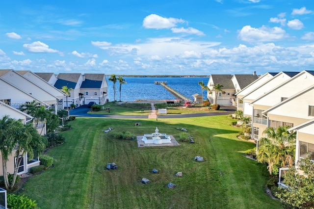 aerial view with a water view and a residential view