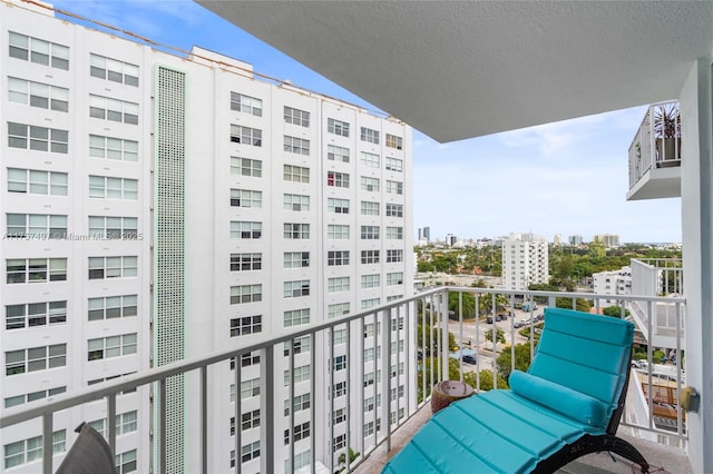 balcony featuring a city view