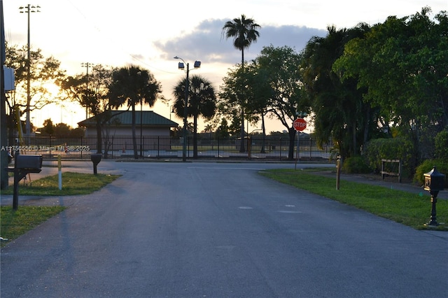 view of street featuring street lighting and traffic signs