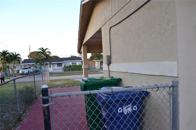 view of property exterior featuring fence