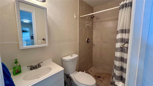 3282 NW 13th St, Lauderhill, FL 33311 - bathroom with toilet, tiled shower, vanity, and a textured wall