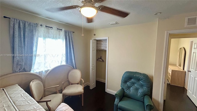3282 NW 13th St, Lauderhill, FL 33311 - living area with visible vents, baseboards, a textured ceiling, and a ceiling fan