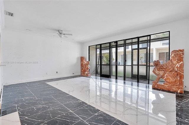 21375 Marina Cove Cir Unit 14-A, Aventura, FL 33180 - empty room featuring a ceiling fan, marble finish floor, visible vents, and baseboards