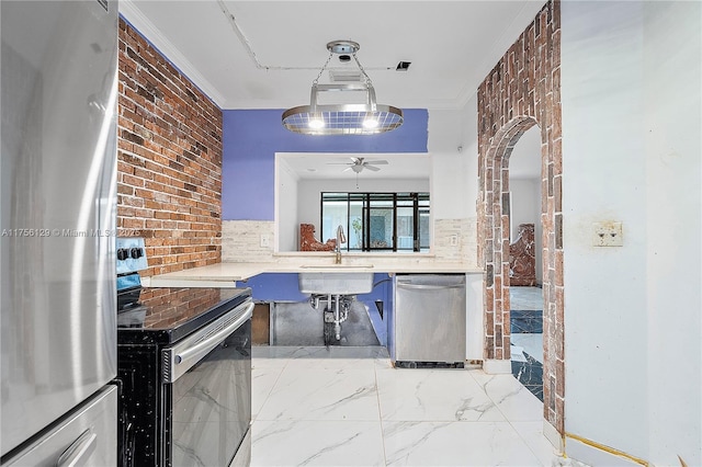 21375 Marina Cove Cir Unit 14-A, Aventura, FL 33180 - kitchen with stainless steel appliances, a sink, marble finish floor, light countertops, and crown molding