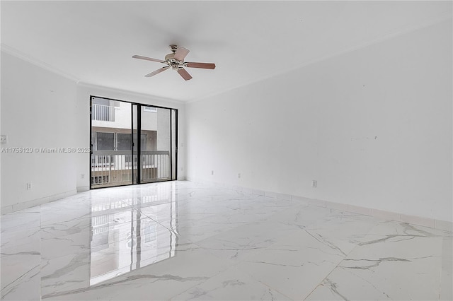 21375 Marina Cove Cir Unit 14-A, Aventura, FL 33180 - spare room with marble finish floor, ornamental molding, and baseboards