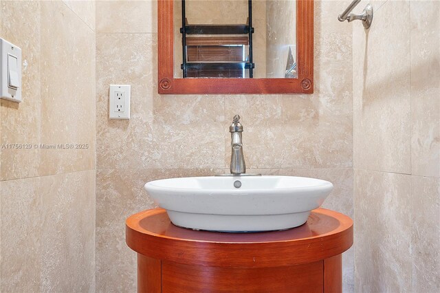 21375 Marina Cove Cir Unit 14-A, Aventura, FL 33180 - bathroom featuring a sink and tile walls