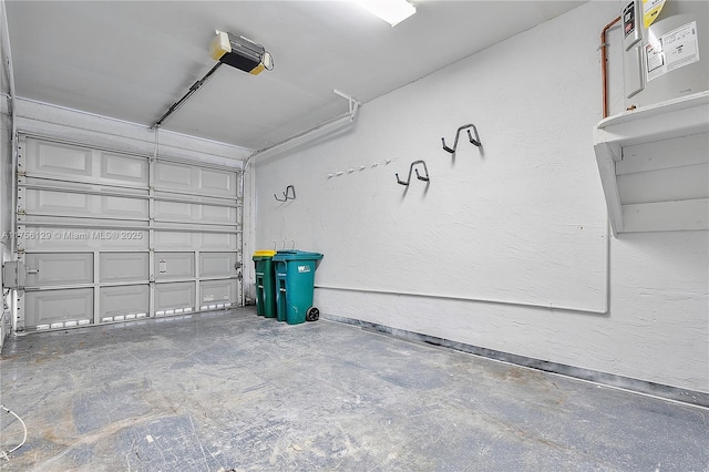 21375 Marina Cove Cir Unit 14-A, Aventura, FL 33180 - garage featuring a garage door opener