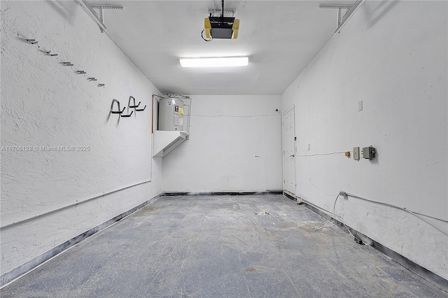 21375 Marina Cove Cir Unit 14-A, Aventura, FL 33180 - garage with a textured wall and a garage door opener
