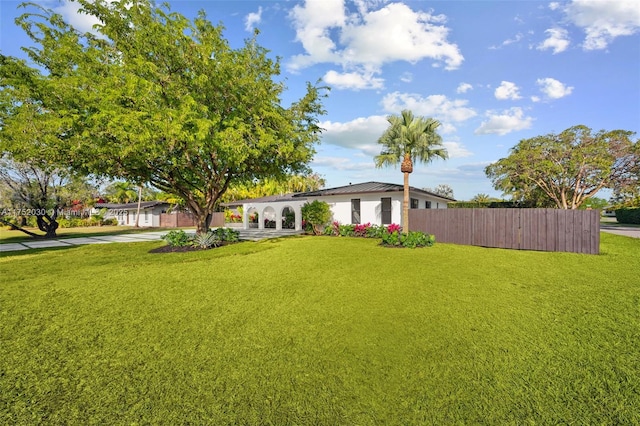 view of yard featuring fence